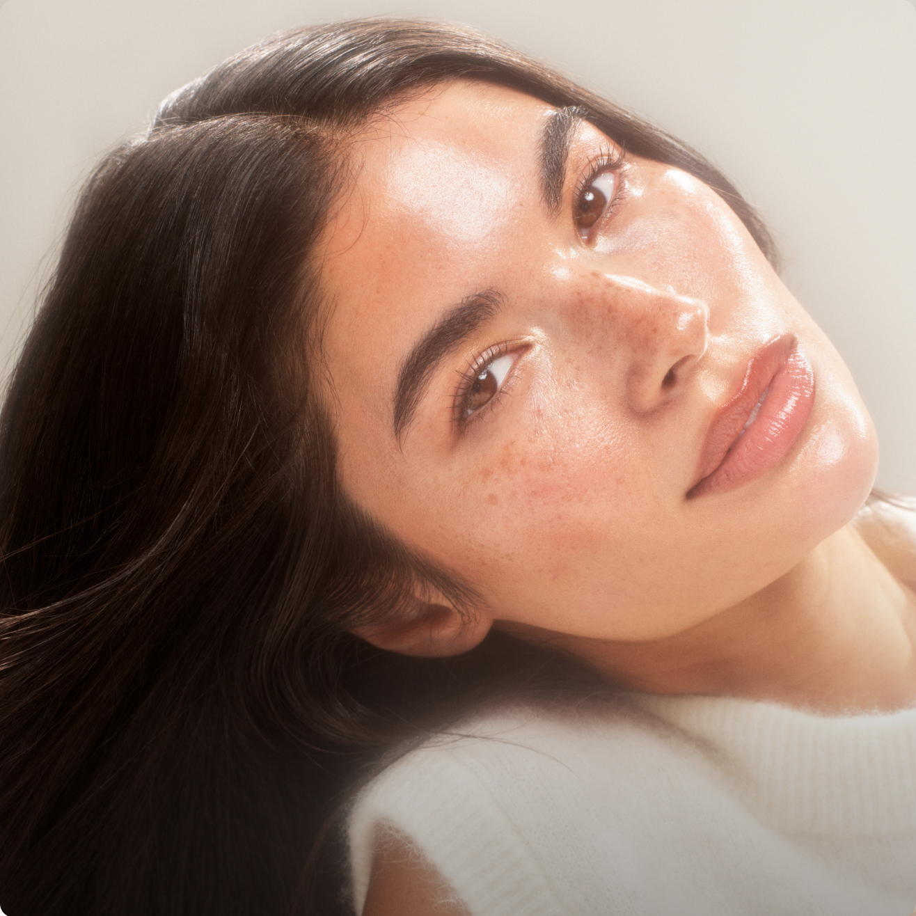 Woman wearing Wake me up complexion enhancer